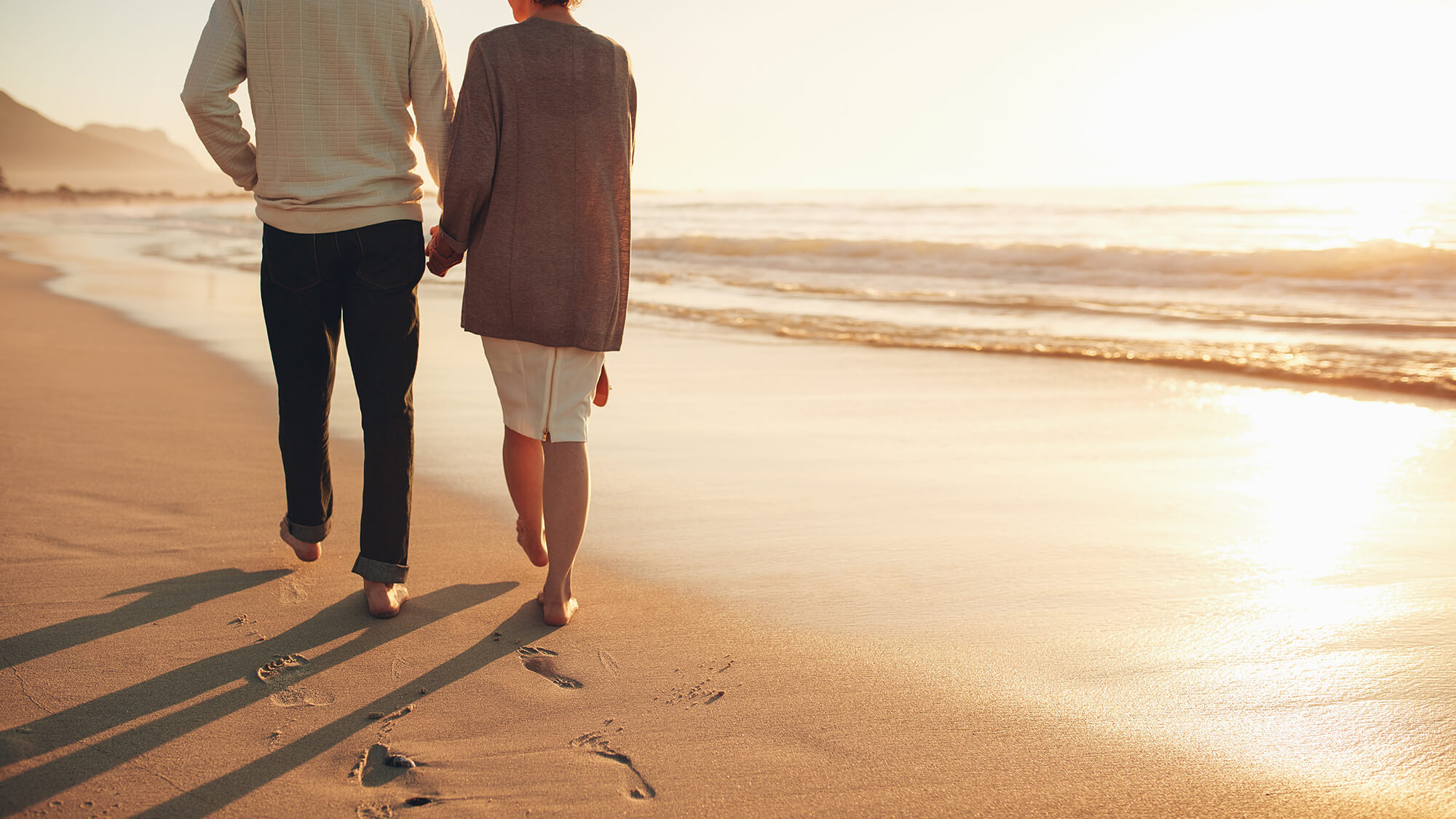 Retired couple on the beach